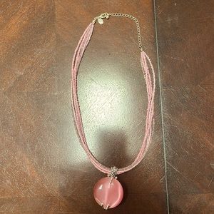 Beaded necklace with beautiful pink stone